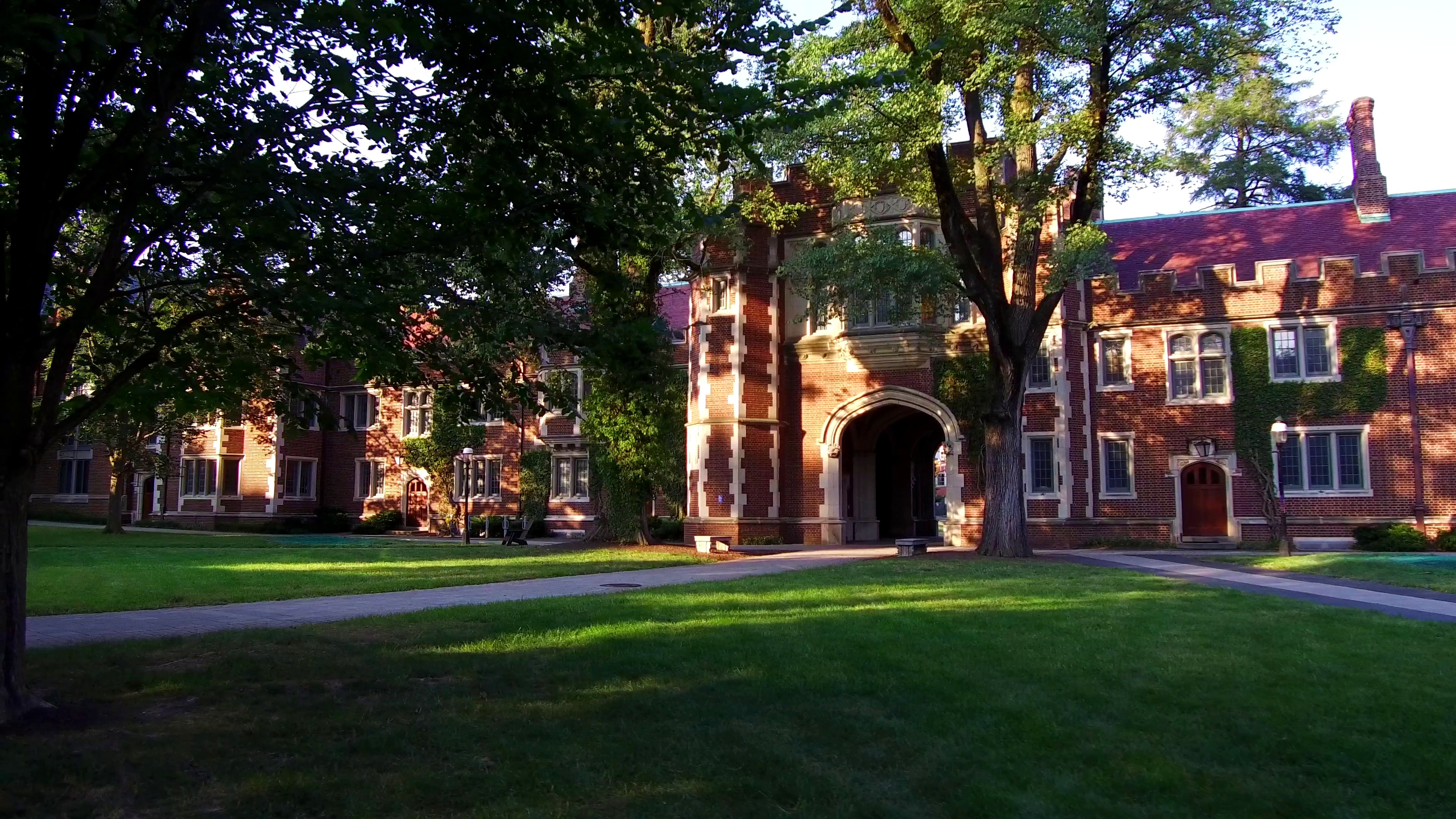 Ivy-covered collegiate Gothic campus at golden hour